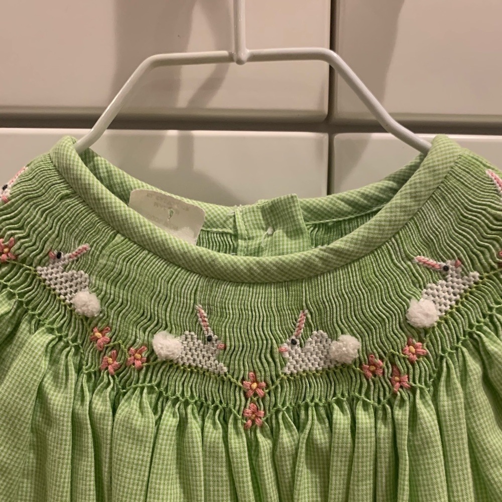 Hand smocked beautiful little girls dress in size 3.